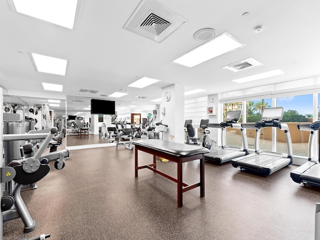 exercise room featuring visible vents