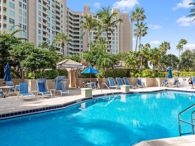 pool with a patio