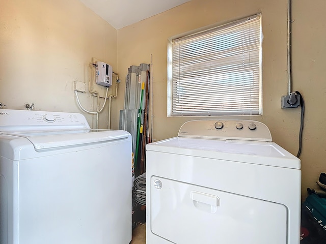 6293 NW 27th St, Margate, FL 33063 - laundry room with laundry area and washer and clothes dryer
