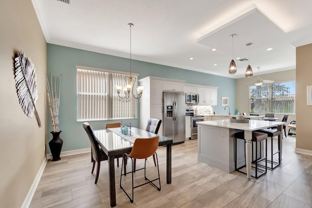 6782 Hillsdale Pt, Boynton Beach, FL 33437 - dining room featuring recessed lighting, visible vents, baseboards, crown molding, and ceiling fan with notable chandelier