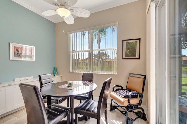 6782 Hillsdale Pt, Boynton Beach, FL 33437 - dining space with baseboards, ornamental molding, a ceiling fan, and light wood-style floors