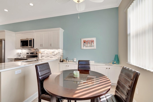 6782 Hillsdale Pt, Boynton Beach, FL 33437 - dining area featuring ornamental molding, a ceiling fan, and recessed lighting