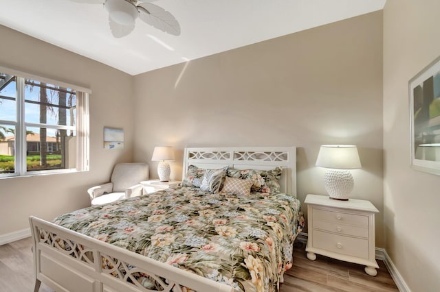 6782 Hillsdale Pt, Boynton Beach, FL 33437 - bedroom with a ceiling fan, light wood-type flooring, and baseboards