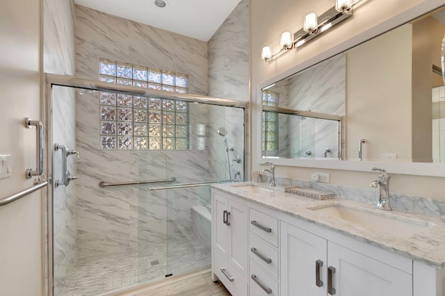 6782 Hillsdale Pt, Boynton Beach, FL 33437 - bathroom featuring double vanity, a marble finish shower, and a sink