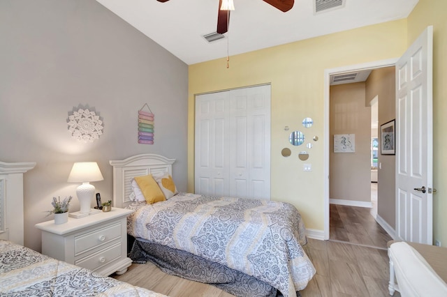 6782 Hillsdale Pt, Boynton Beach, FL 33437 - bedroom with baseboards, visible vents, ceiling fan, light wood-type flooring, and a closet