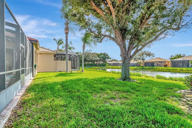 6782 Hillsdale Pt, Boynton Beach, FL 33437 - view of yard featuring a lanai and a water view