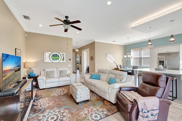 6782 Hillsdale Pt, Boynton Beach, FL 33437 - living area with recessed lighting, ceiling fan with notable chandelier, visible vents, light wood-style floors, and crown molding