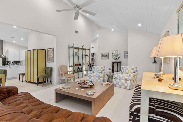 living room with high vaulted ceiling, recessed lighting, visible vents, and ceiling fan