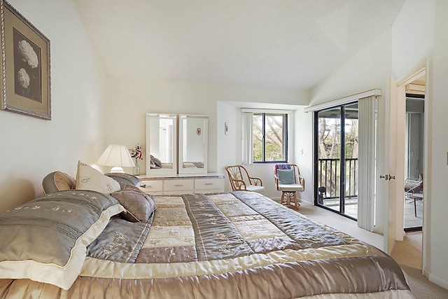 bedroom with access to outside, carpet flooring, and vaulted ceiling