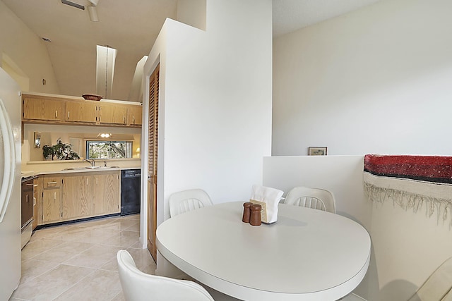 dining area with light tile patterned floors