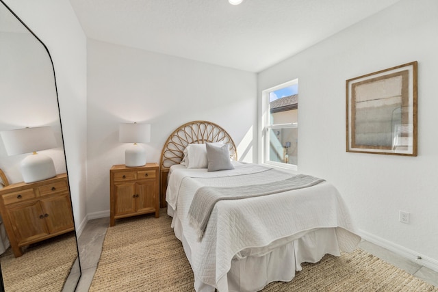 bedroom with baseboards