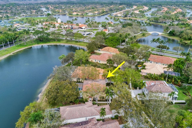 aerial view with a water view and a residential view