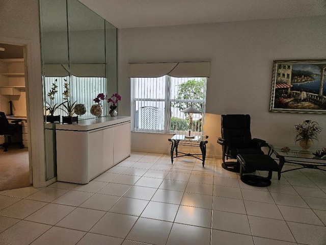 sitting room featuring light tile patterned floors