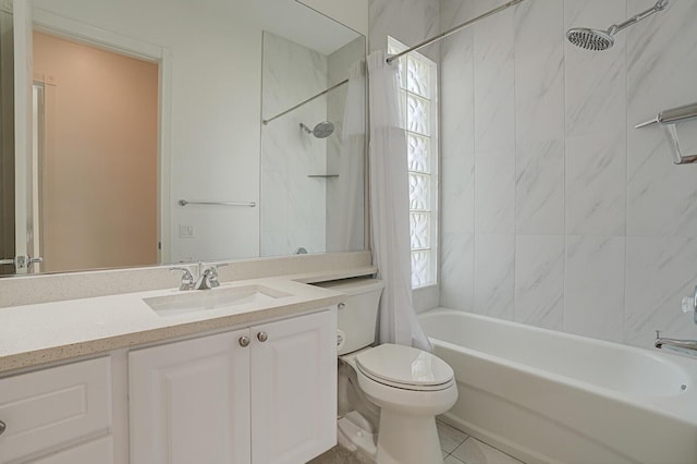 bathroom with tile patterned floors, vanity, toilet, and shower / bath combo with shower curtain