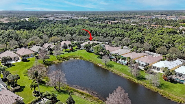 birds eye view of property featuring a water view and a residential view