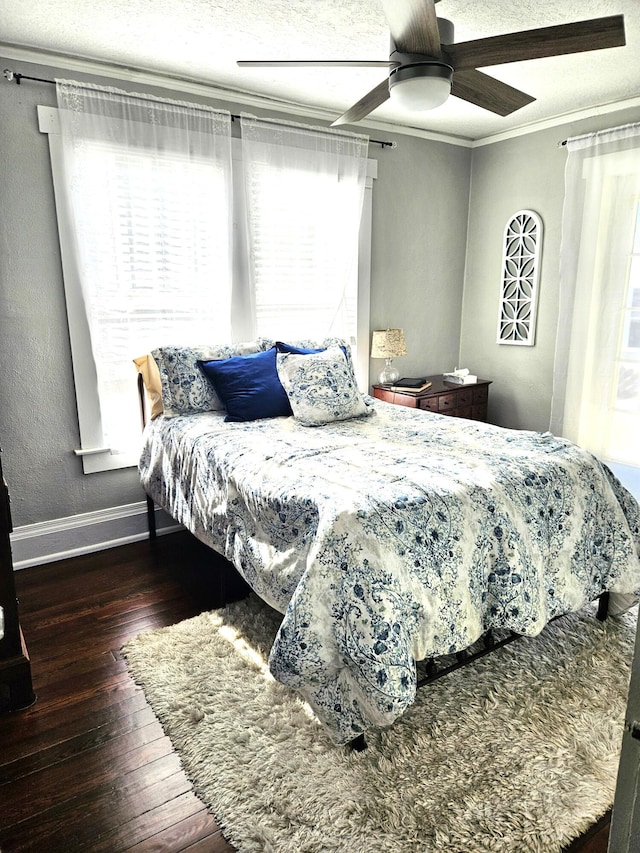 206 Edgewood Dr, West Palm Beach, FL 33405 - bedroom featuring a ceiling fan, crown molding, baseboards, and hardwood / wood-style flooring