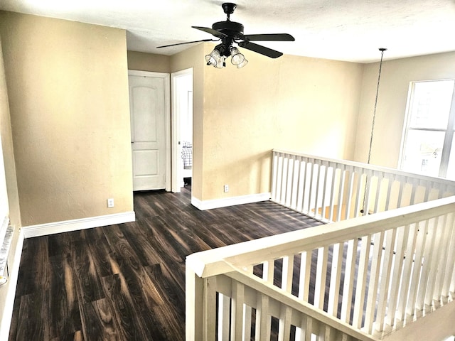206 Edgewood Dr, West Palm Beach, FL 33405 - stairway featuring baseboards, ceiling fan, and wood finished floors