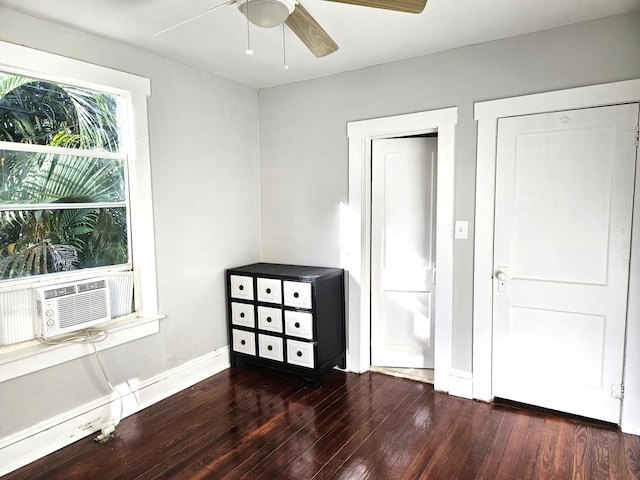 206 Edgewood Dr, West Palm Beach, FL 33405 - unfurnished bedroom featuring cooling unit, baseboards, a ceiling fan, and hardwood / wood-style flooring
