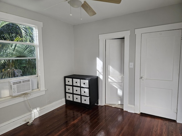 bedroom featuring wood-type flooring, cooling unit, a ceiling fan, and baseboards