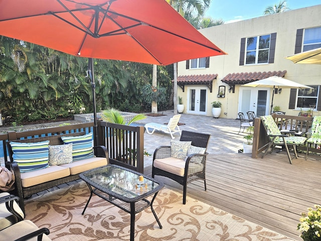 wooden terrace featuring french doors