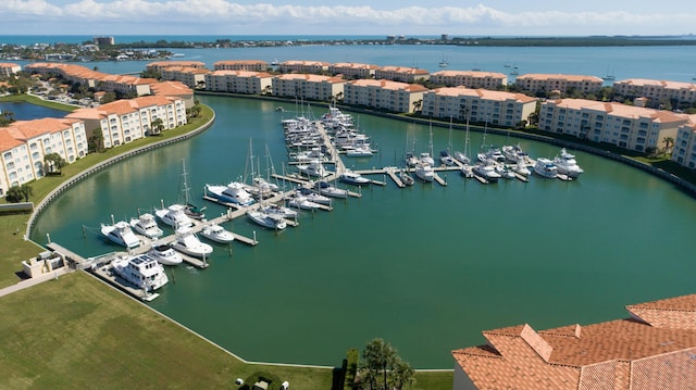 birds eye view of property featuring a water view