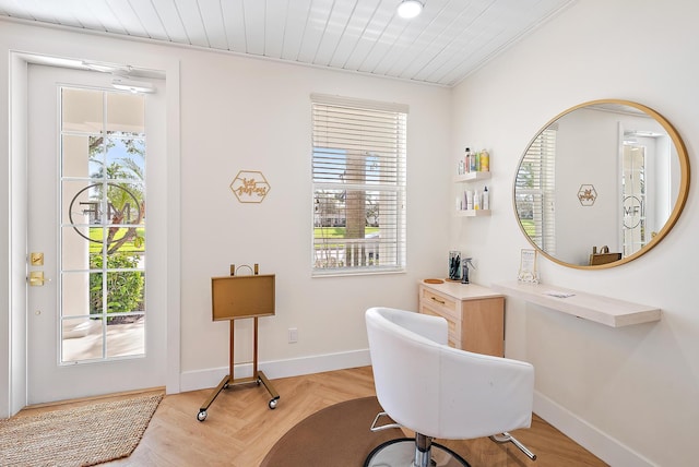 interior space with a wealth of natural light and baseboards