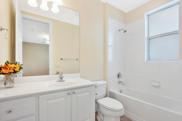 full bathroom featuring toilet, vanity, and shower / bathing tub combination