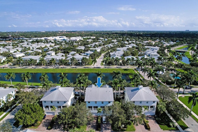 aerial view featuring a water view and a residential view