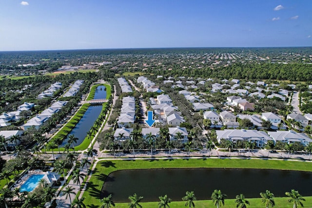 bird's eye view with a residential view and a water view