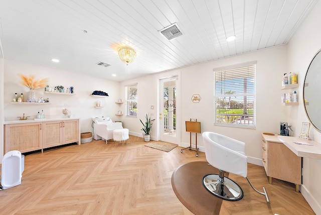 full bathroom with a freestanding bath, visible vents, and baseboards