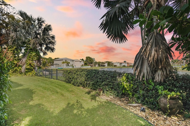 9832 Stover Way, Wellington, FL 33414 - yard at dusk featuring fence