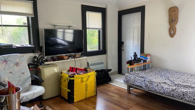 bedroom featuring wood finished floors