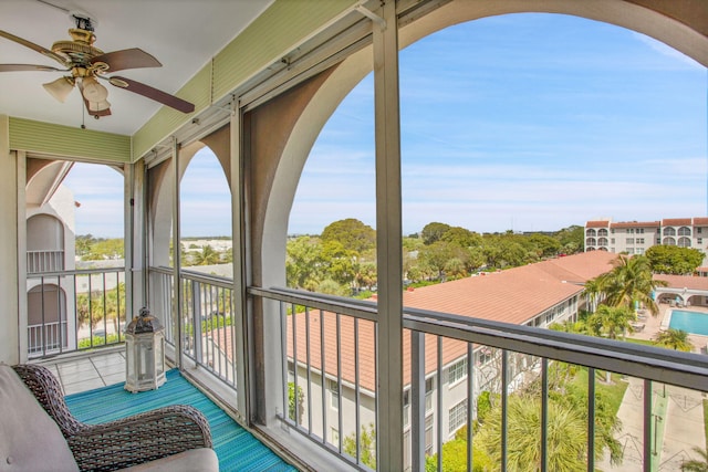 balcony featuring a ceiling fan