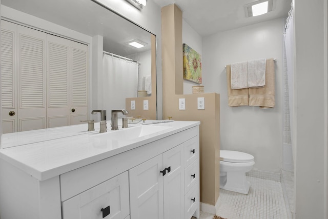 full bath with visible vents, vanity, tile patterned flooring, and toilet