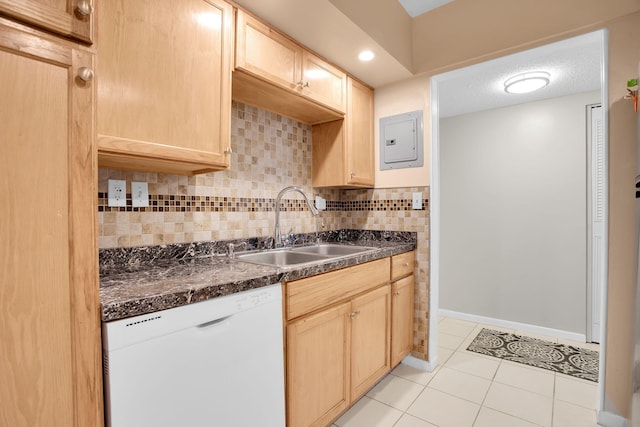 kitchen with electric panel, dishwasher, a sink, and light brown cabinetry