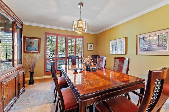 dining room with light carpet, crown molding, a notable chandelier, and baseboards