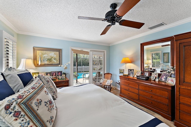 bedroom with access to outside, visible vents, and crown molding