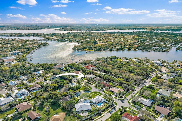 birds eye view of property with a residential view and a water view