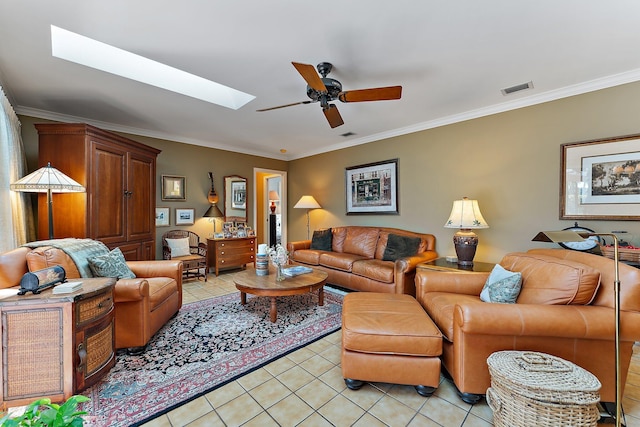 living room with a skylight, visible vents, ornamental molding, and light tile patterned flooring