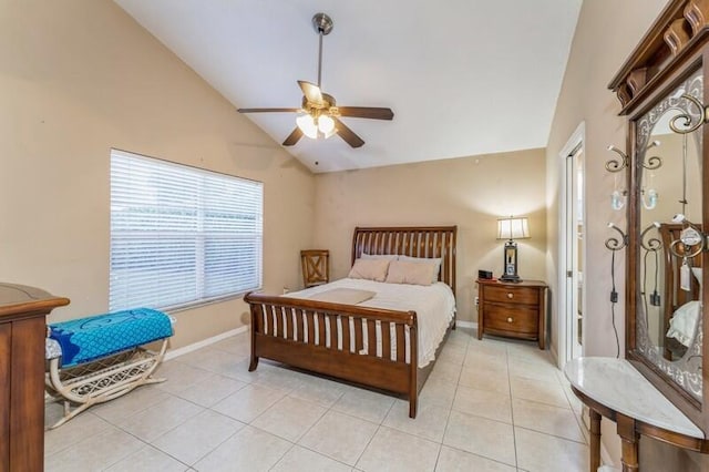 bedroom featuring lofted ceiling, ceiling fan, light tile patterned floors, and baseboards