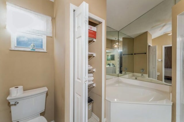 full bath with ceiling fan and toilet