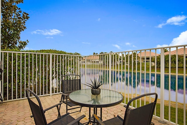 view of patio / terrace featuring a water view