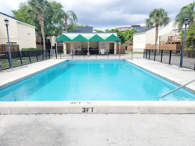 community pool with fence