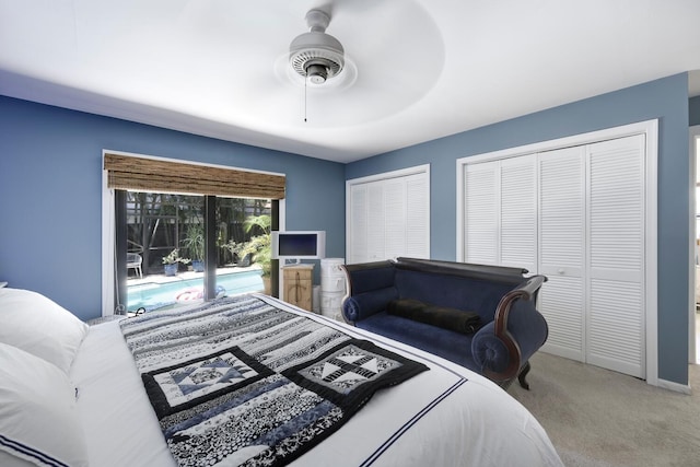 carpeted bedroom with access to outside, a ceiling fan, and multiple closets