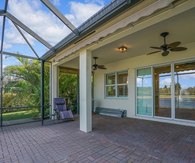 view of patio featuring ceiling fan