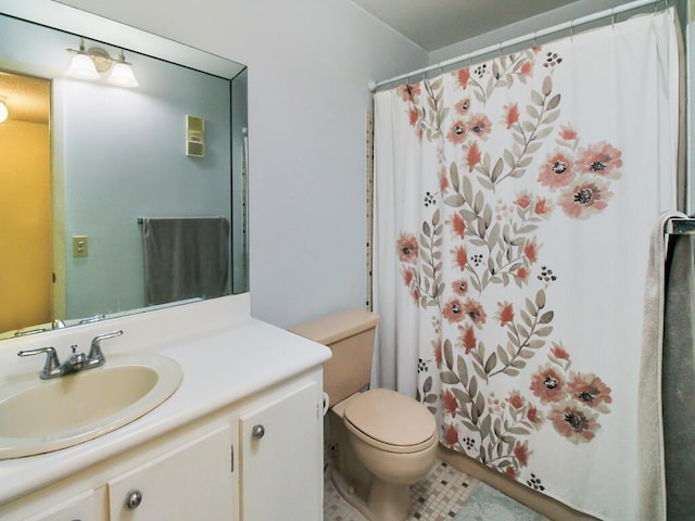 bathroom featuring tile patterned flooring, vanity, toilet, and a shower with curtain