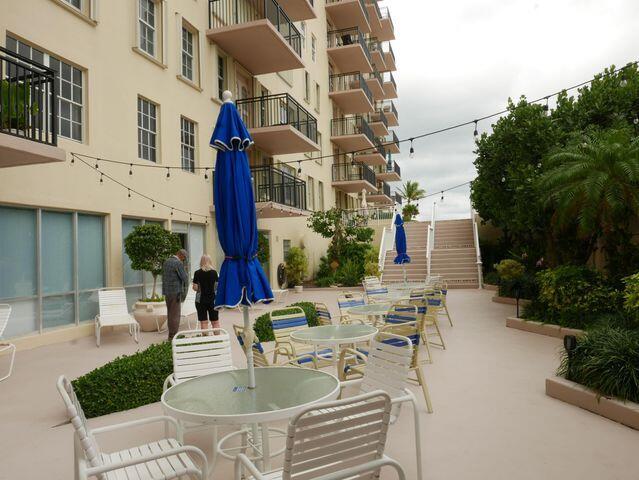 view of patio / terrace featuring stairs and outdoor dining area