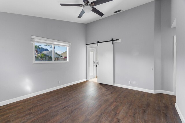 walk in closet featuring dark wood-style floors