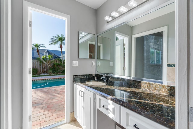 bathroom featuring tile patterned floors and vanity