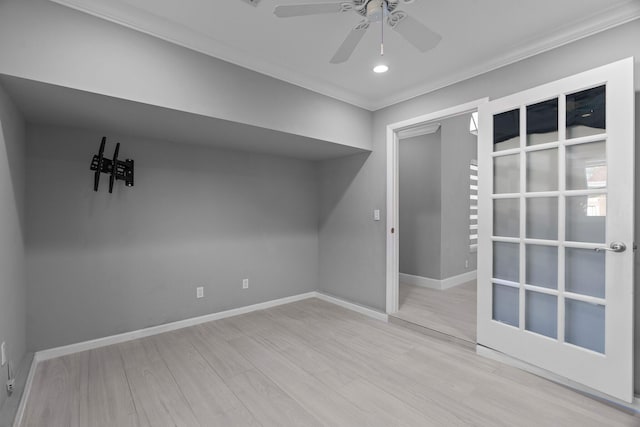 additional living space featuring light wood-style floors, baseboards, a ceiling fan, and recessed lighting